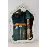 A vintage wooden framed wall mirror 84cm x 57cm collection only