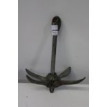 A vintage metal boat anchor (collapsible)