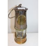 A vintage colliery miners lamp