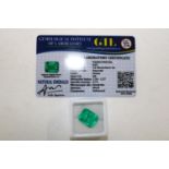 A emerald gemstone with cert