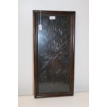 A framed & glazed carved oak panel 60cm x 29cm