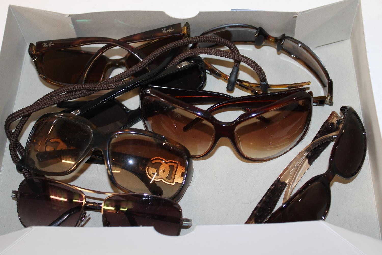 A selection of designer sunglasses Ray Ban (prescription lens so no etching) D&G, Chloe, Missoni,