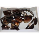 A selection of designer sunglasses Ray Ban (prescription lens so no etching) D&G, Chloe, Missoni,