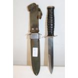 A US M3 bayonet by Boker & Co USA with US M8 scabbard