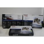 Three boxed digital picture frames
