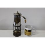 A vintage colliery miners lamp, pit check and NCB mug