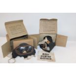 Two boxed WW2 period gas masks