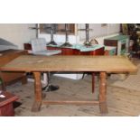 A quality Robert 'Mouseman' Thompson light oak adzed refectory dining table from the 1960's. 72