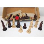 A box of erotic chess pieces (complete)