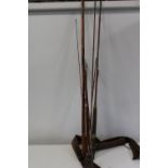 A vintage Hardy Bro's bamboo fishing rod with spare top section in bamboo tube & one other split