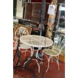 A metal garden table (D76 H79cm) & chairs, metal bench ends, parasol & base. Collection Only
