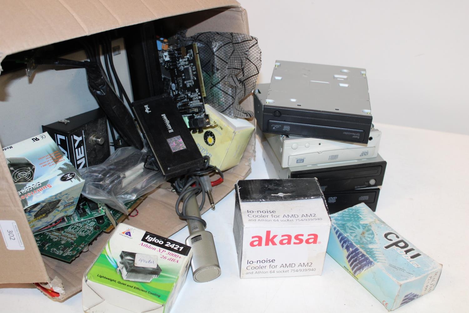 A box full of assorted computer components etc