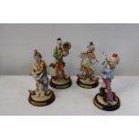 Four collectable Leonardo clown figures approx h 27cm