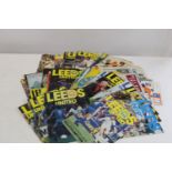 A job lot of vintage Leeds United football programmes etc