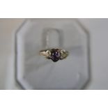 A 9ct gold amethyst heart ring size L