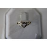A 9ct gold heart wishbone ring size H 1/2