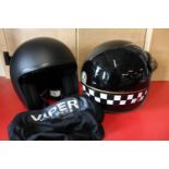 Two crash helmets