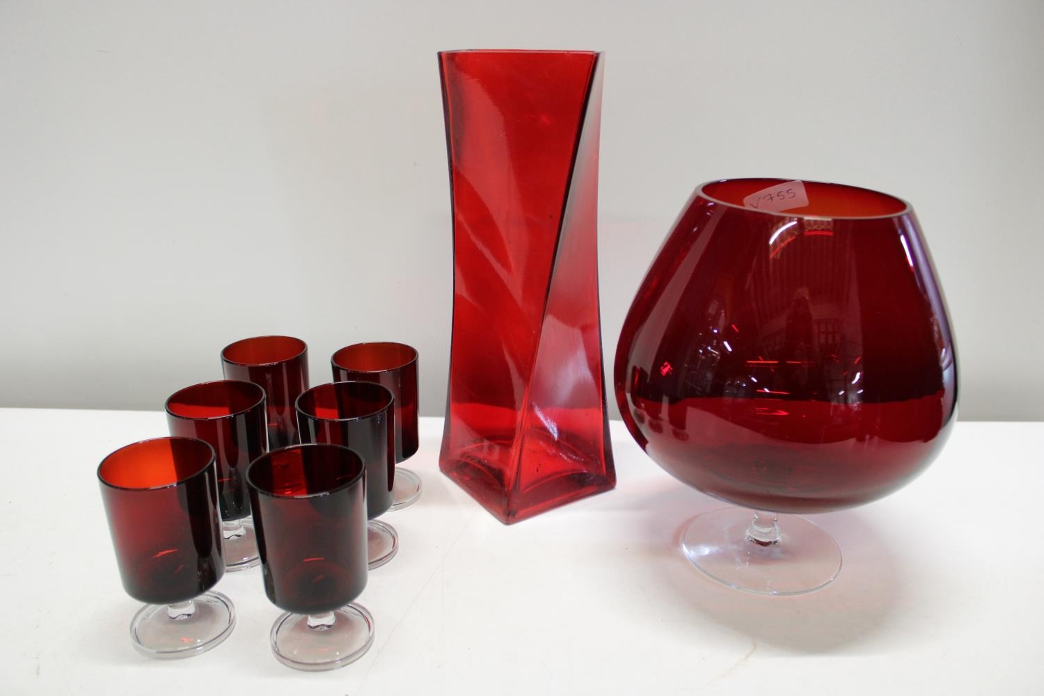 A collection of red glass ware