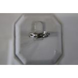 A 9ct white gold woven band ring size m