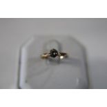 A 9ct gold solitaire ring size L