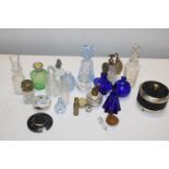 A selection of assorted glass bottles & other