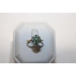 A 9ct gold diamond & green stone ring 1.7 grams size N