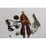 A 1970's action figure & cap gun