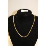 A 14ct gold rope twist necklace 23.2 grams. 46cm long