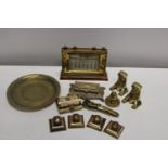 A selection of assorted vintage brass ware