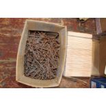 A box of white ceramic tiles & box of nails Collection Only