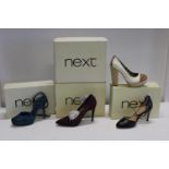 Four boxed pairs of Next new ladies Shoes ( 3 x Size 5, 1 x Size 4 1/2)