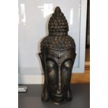 A large cast metal Buddha head 67cm height. Collection only