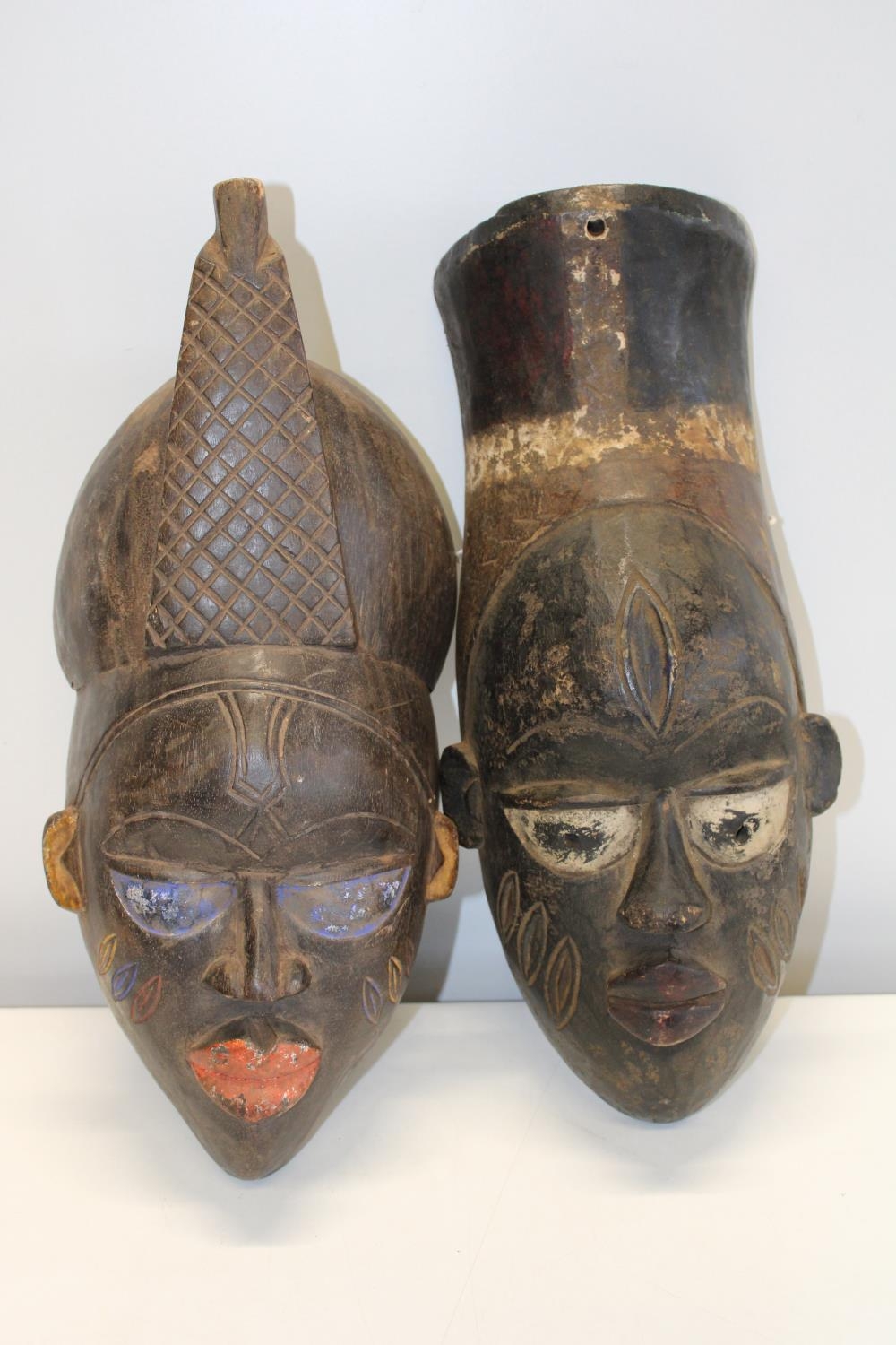 A pair of antique African tribal masks 46cm height