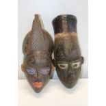 A pair of antique African tribal masks 46cm height