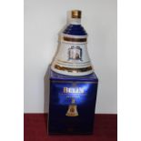 A sealed bottle of Bells whisky for the 50th wedding anniversary of The Queen & Prince Phillip 1997