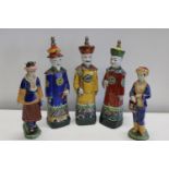 A selection of oriental ceramic figures. Tallest 40cm
