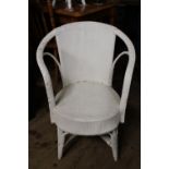 A vintage white wicker chair Collection Only