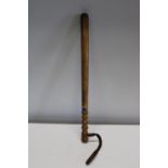 A vintage military issue wooden truncheon
