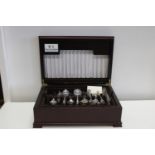 A cased set of 'Grecian Insignia' cutlery in a Arthur Price wooden box. 131 pieces total