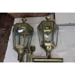 A pair of vintage brass & glass wall lights