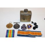A selection of vintage badges & military medals etc