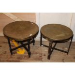 Two vintage brass topped foldable tables. 60 Dia. Collection only