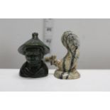 Two hand carved hard stone sculptures