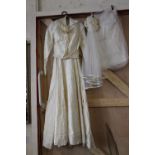 An original vintage wedding dress and accessories