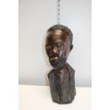 A large hand carved hardwood African bust