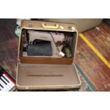 A cased Singer electric sewing machine, Postage unavailable