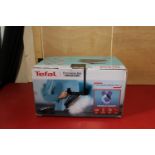 A boxed Tefal Iron