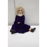 A antique bisque headed German doll, stamped HW 6 1/2