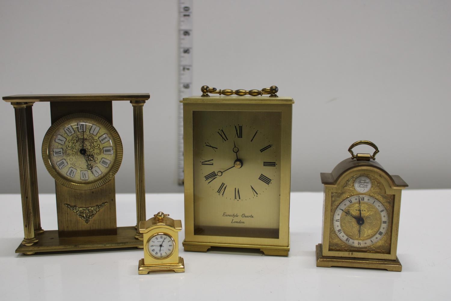 A selection of assorted brass carriage clocks