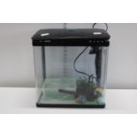 A fish tank and accessories including pump etc